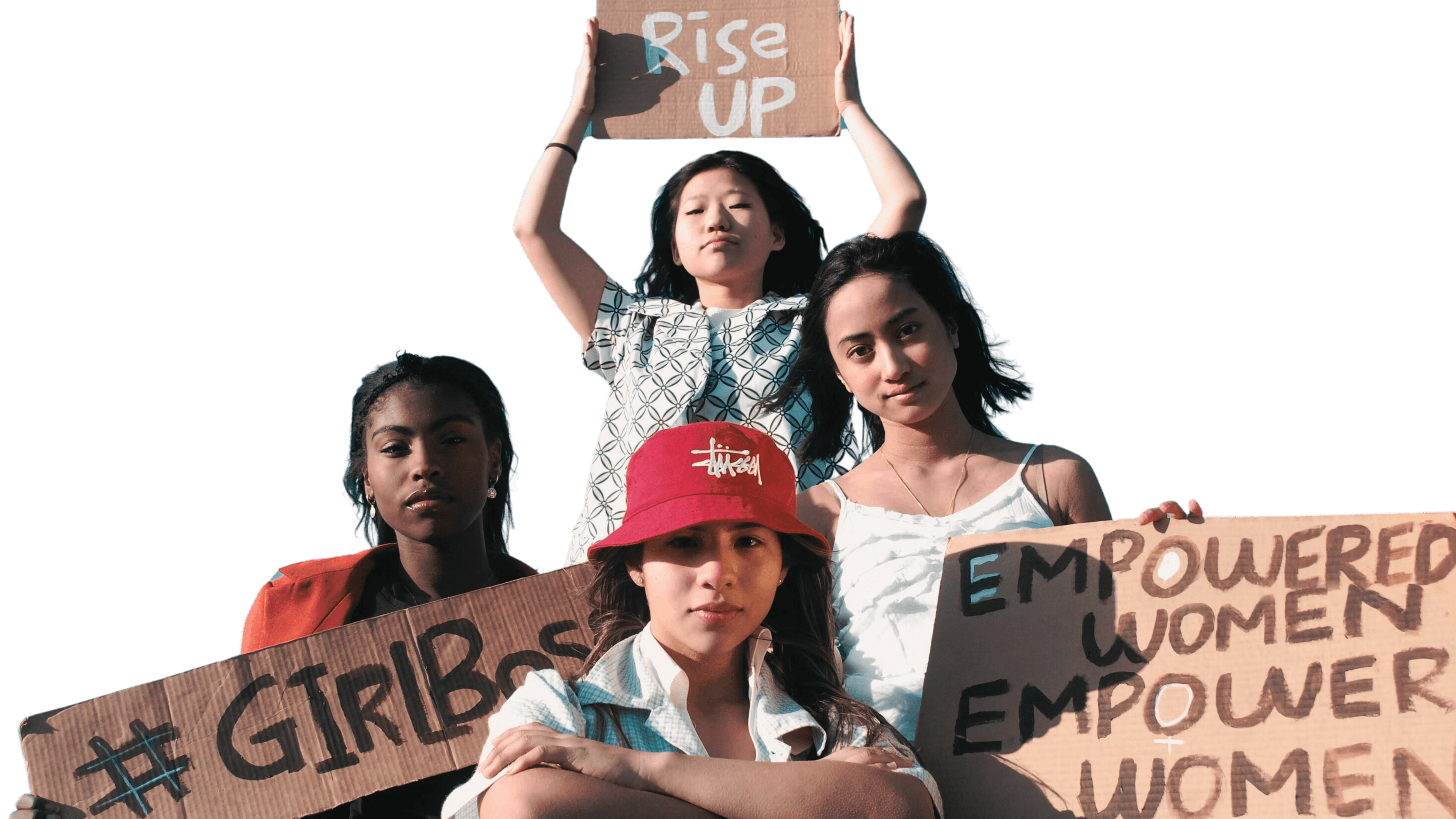 Junge Mädchen halten Schilder beschriftet mit “Rise up”, “#girlboss”, und “Empowered Women Empower Women”
